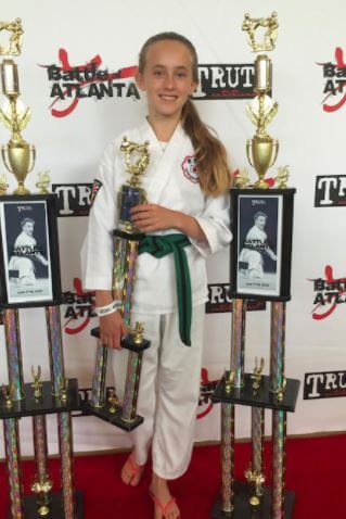 Audrey Mae Kinnear's elder sister, Lily Katherine Kinnear with trophies.